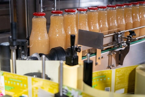 Bottled juice in a factory line
